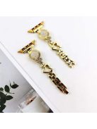 For Apple Watch Series 10 42mm / 9 8 7 41mm / 6 5 4 SE SE (2022) SE (2023) 40mm / 3 2 1 38mm Ethnic Style Metal Watch Band Heart Rhinestone Decor Bracelet Wrist Strap - Gold