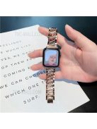 Metal Watchband X Design Rhinestone Decor Watch Band Strap Replacement for Apple Watch Series 10 46mm / Ultra 2 Ultra 49mm / 9 8 7 45mm / SE (2023) SE (2022) SE 6 5 4 44mm / 3 2 1 42mm - Rose Gold